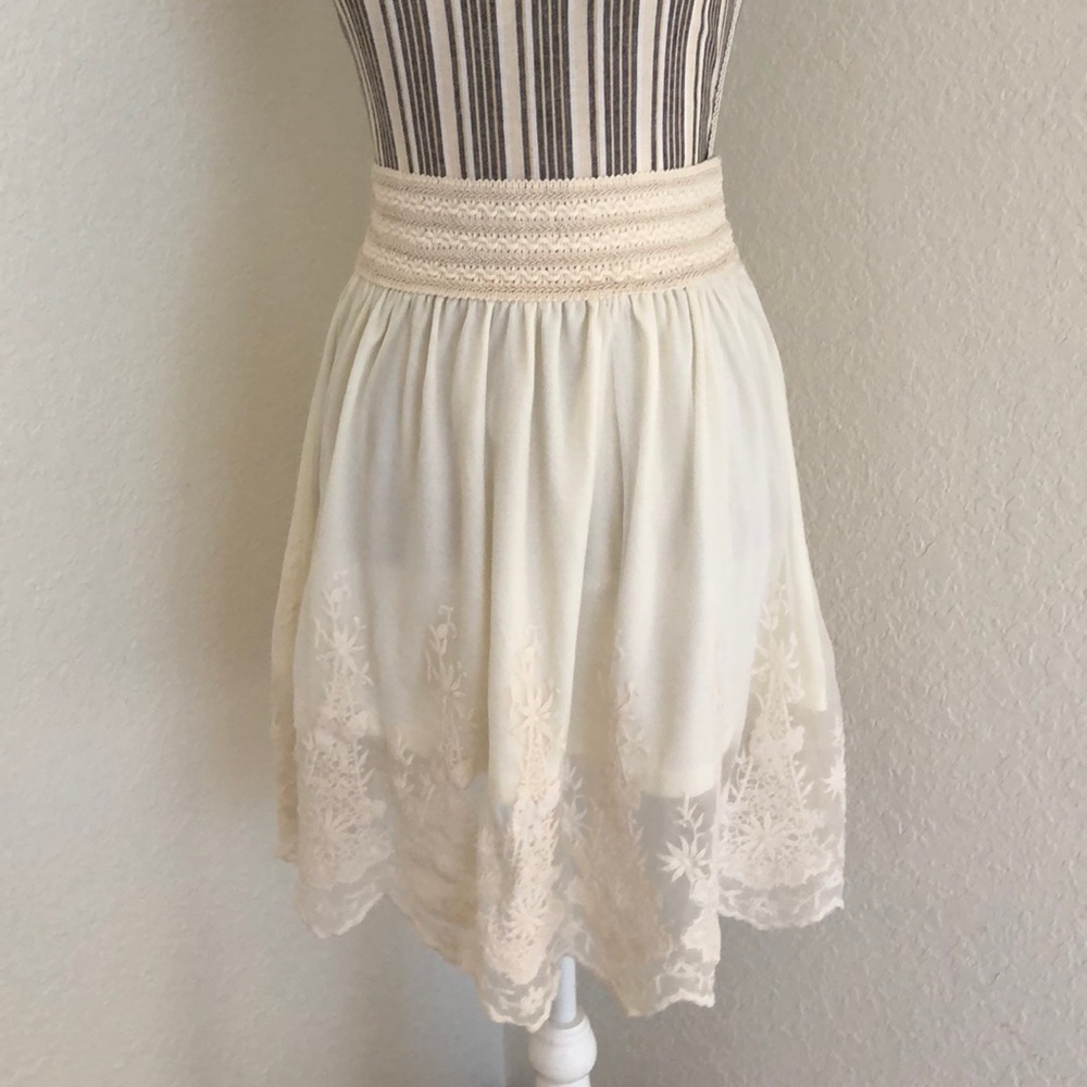 Women's Cream Midi Skirt with Embroidered Hem